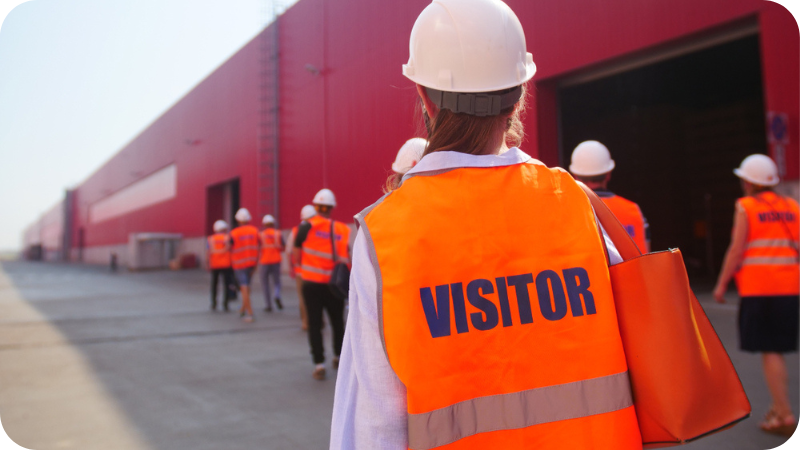The-Downsides-of-Manua-Visitor-Management-Systems_group-of-visitors-on-factory-tour