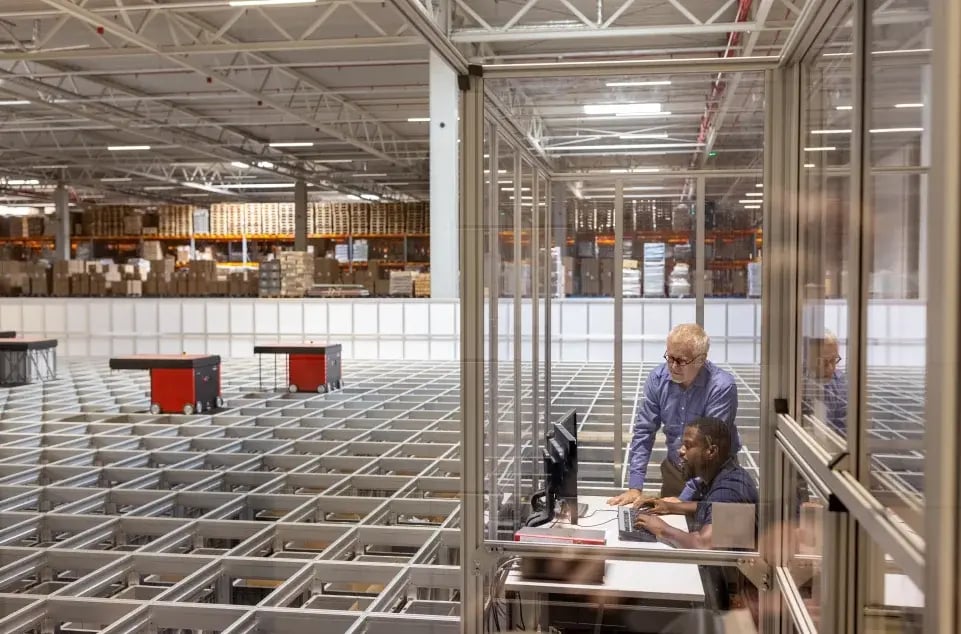 Managers overseeing assets through asset management system