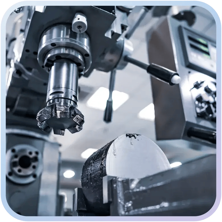 The cutting tool and workpiece within a CNC milling machine.